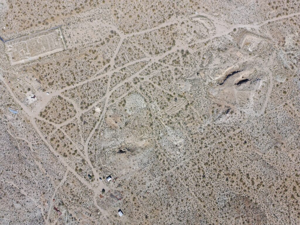 Overhead view of Hill 1 (bottom left), Hill 2 (top right), and leach pad from 1980s operation (top left)